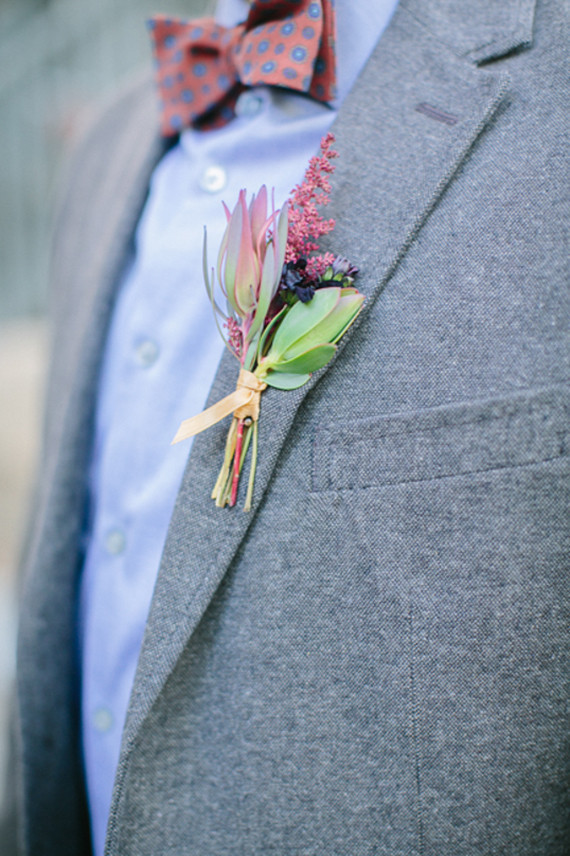 Plum colored boutonierre