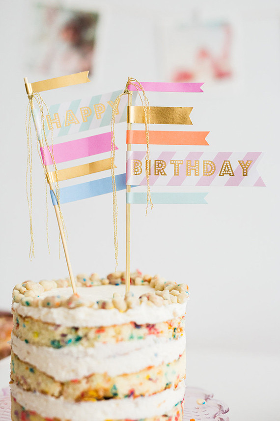 Naked layer cake with washi tape flag topper | See more on 100 Layer Cake