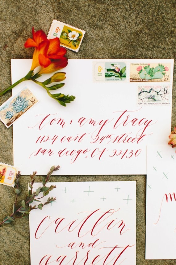 Red calligraphed invites