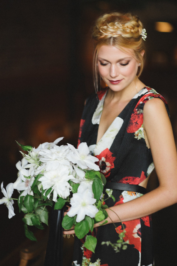 Dutch wedding bride with floral dress and white daisy bouquet