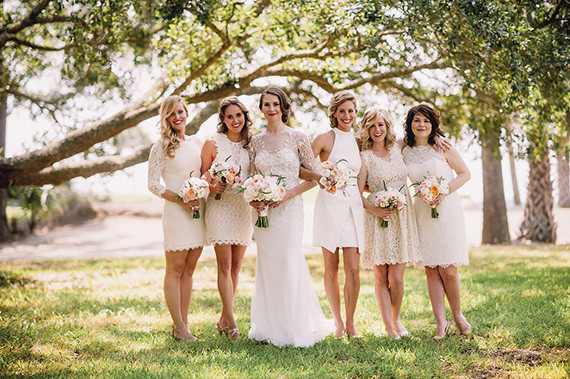 Outdoor bridesmaid with cream colored dresses