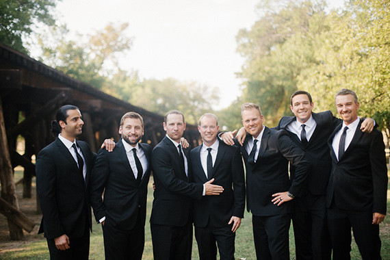 Groomsmen in black suits