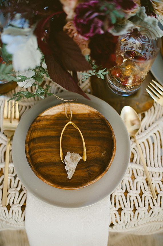 Bohemian New Years brunch place setting with gold wish bone