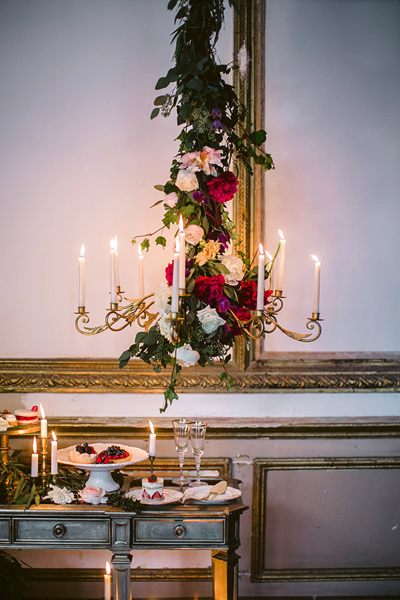 Romantic Luxe wedding handling gold candleabra