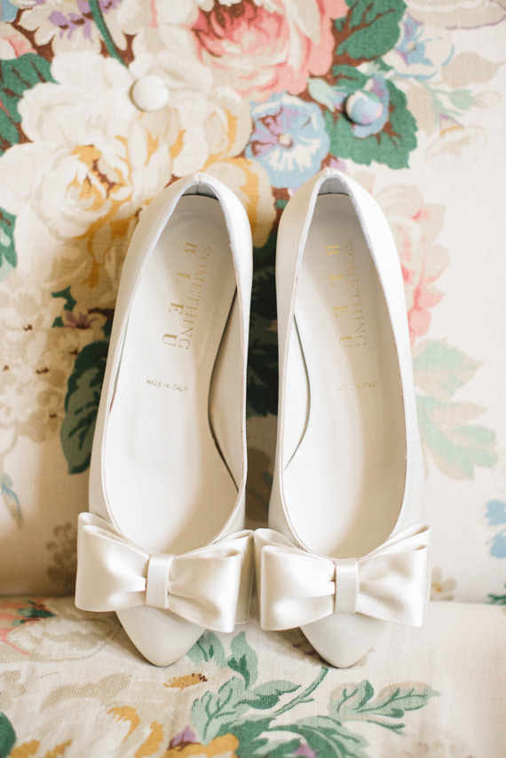 White bow wedding shoes