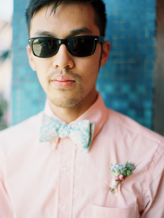 Pink shirt with blue bow tie