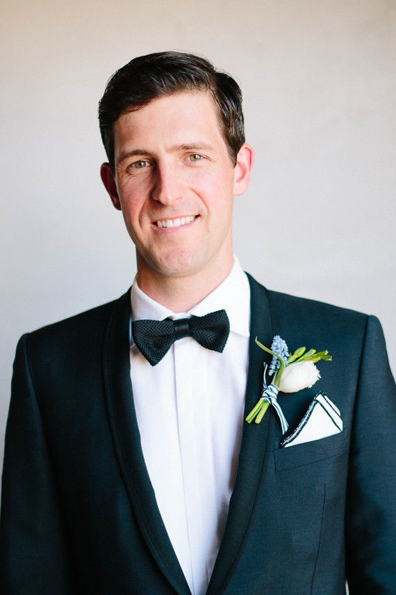 Groom with bow tie and boutonniere