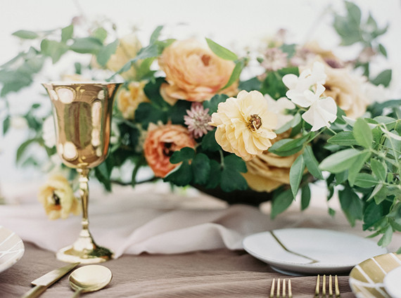 Orange ranunculus floral centerpiece