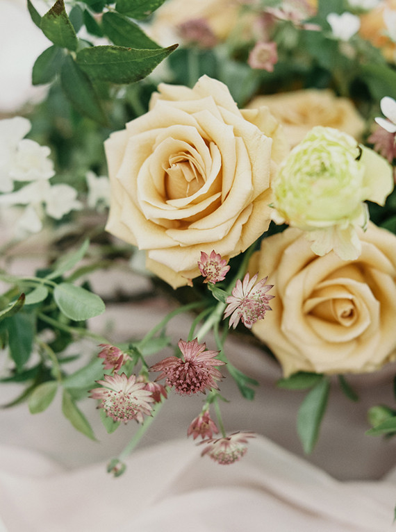 Rose and ranunculus floral centerpiece
