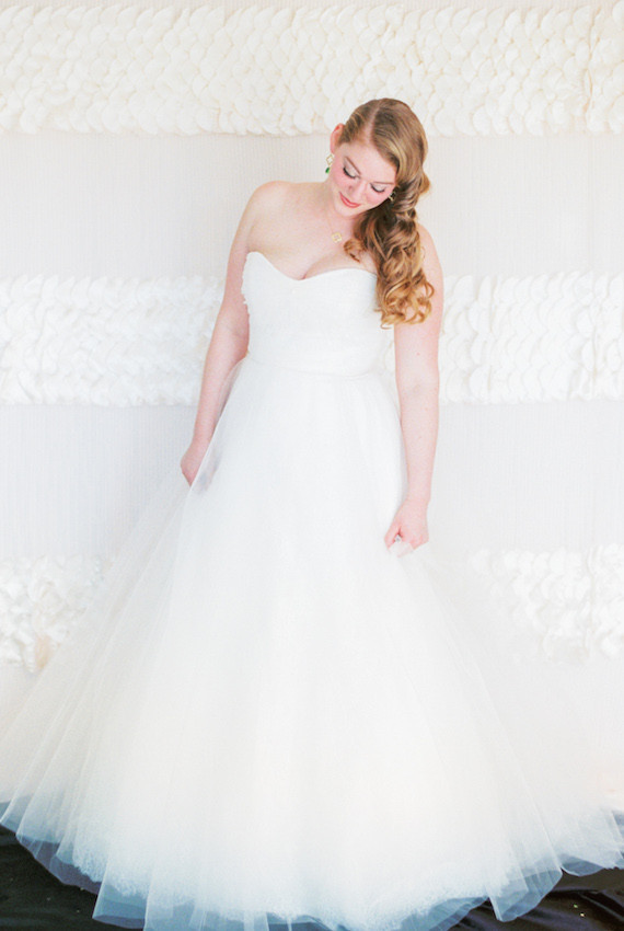 Bride in white fluffy wedding dress
