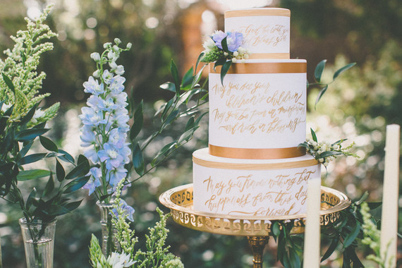 Gold calligraphy wedding cake