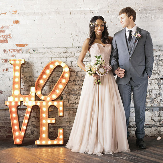 Industrial Wedding Portrait with Marquee Sign