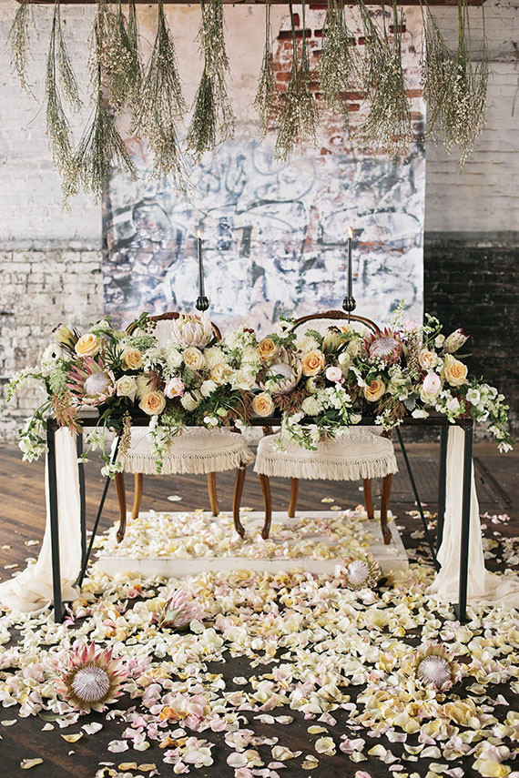 Industrial Wedding Sweetheart Table Protea Decor Inspiration