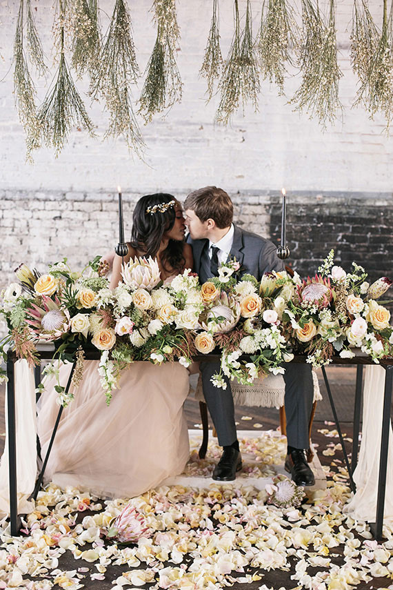 Industrial Wedding Sweetheart Table Protea Decor Inspiration