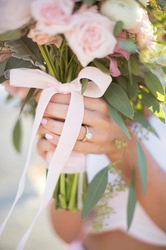 Pink bow tie on bouquet