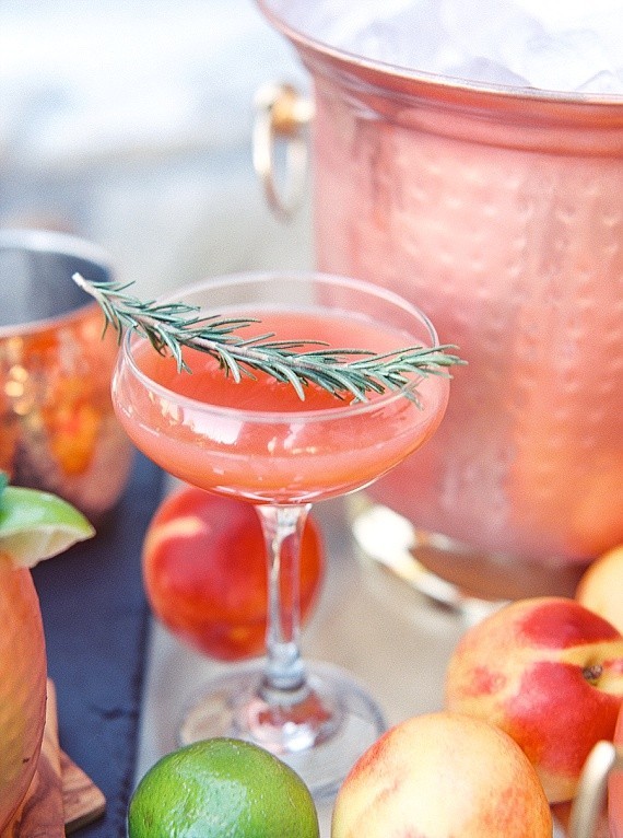 Orange cocktail with sprig