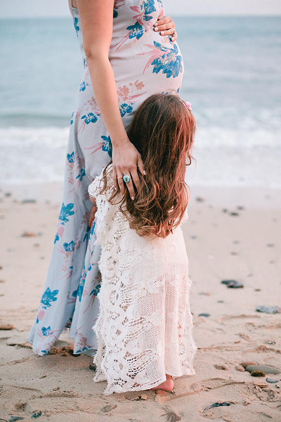 Beach maternity photos by Megan Welker