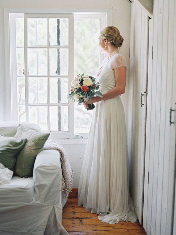 Lace cap sleeved wedding dress