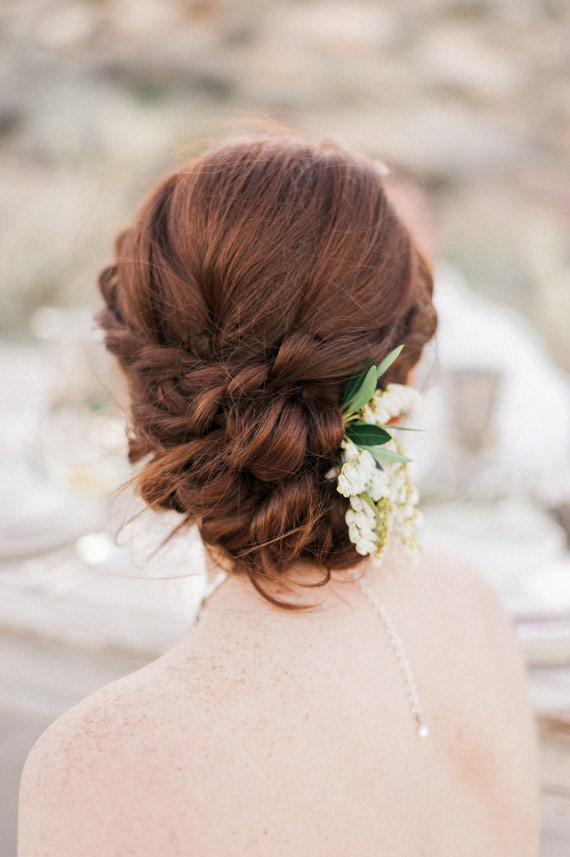 Bride hairstyle with small flower