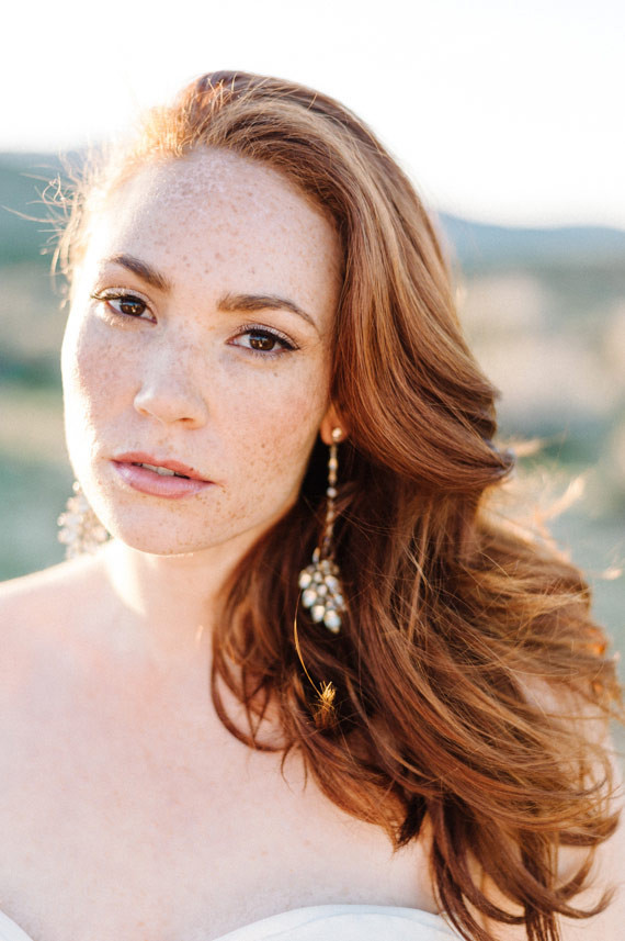 Outdoor bride portrait with accessories