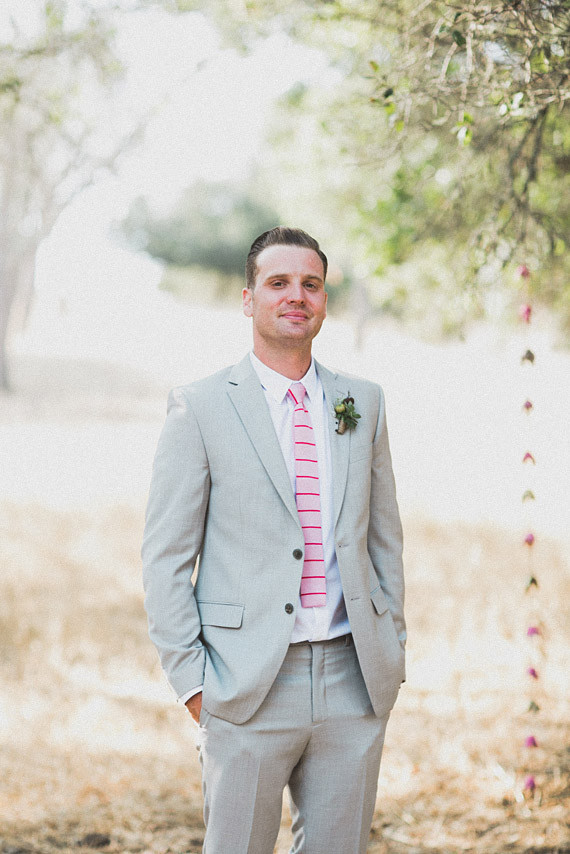 Groom with grey suit and pink tie