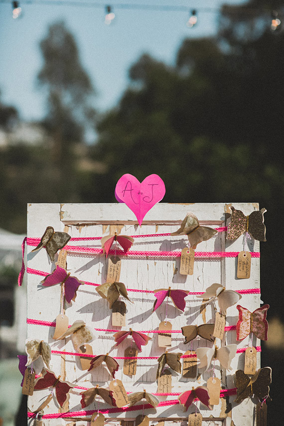 Pink and gold butterfly escort cards