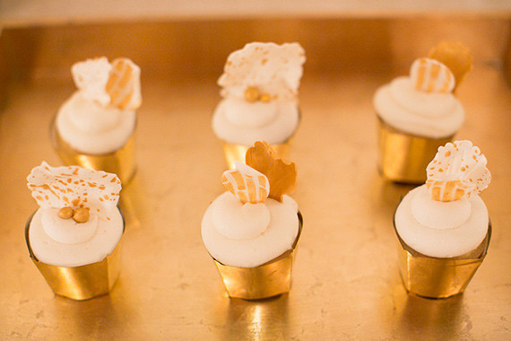Mini gold and white cupcakes
