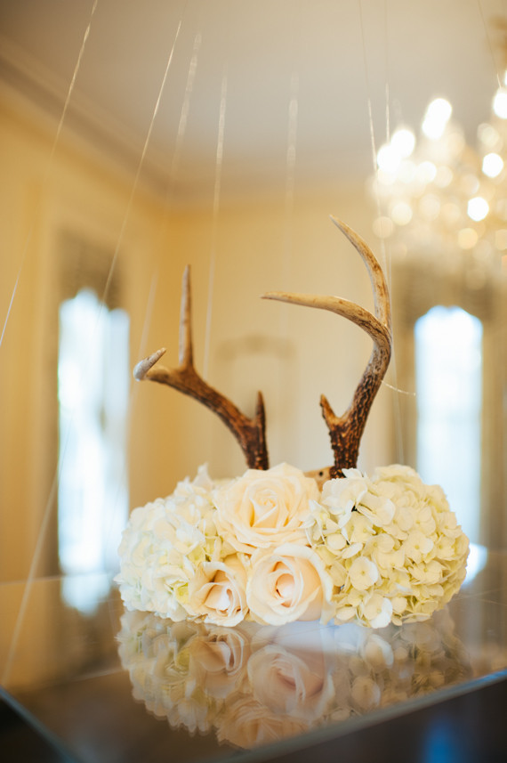 Rose centerpiece with antlers Inspiration