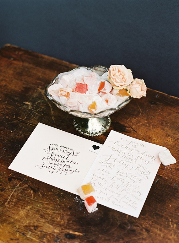 White and gold invitation with candy