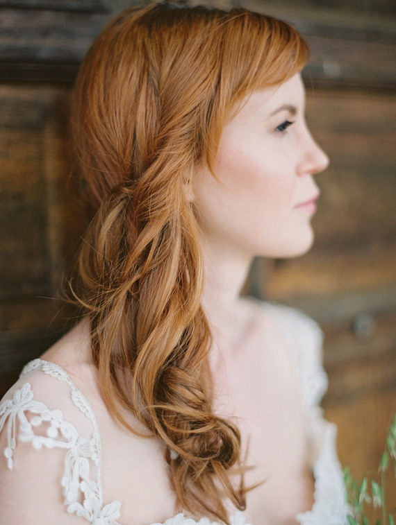 Relaxed side swoop bridal hairstyle