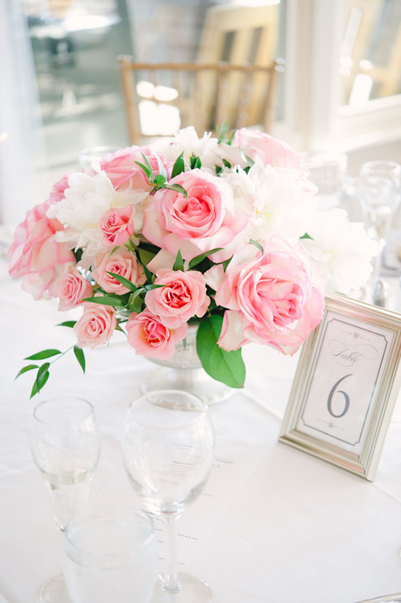 Pink rose centerpiece and silver table number