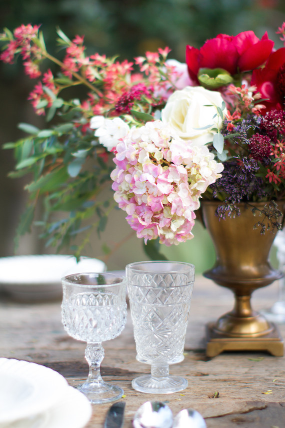 Clear glassware with gold and pink centerpiece Inspiration