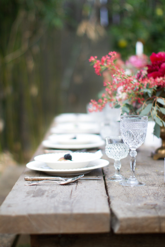 Backyard dinner party wooden tablescape