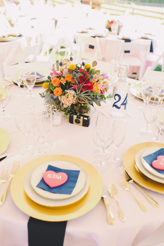 Outdoor light pink and blue place setting with heart favor