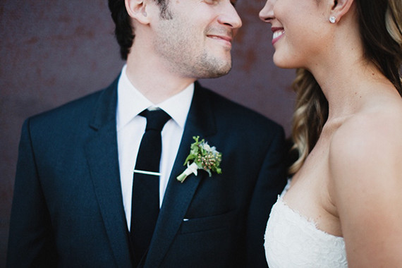 Boutonniere and wedding portrait