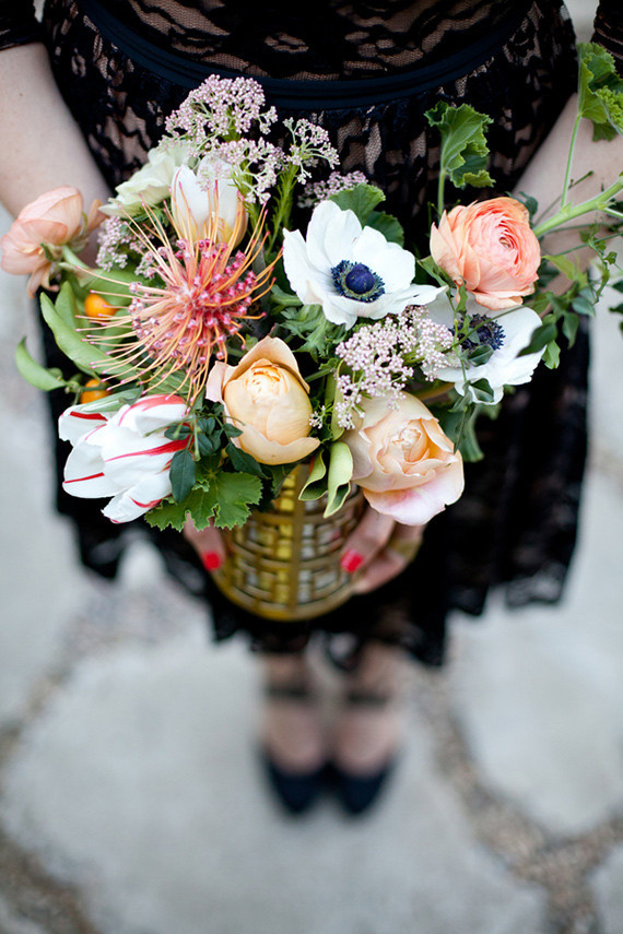 Peonie and air plant centerpiece with gold vase