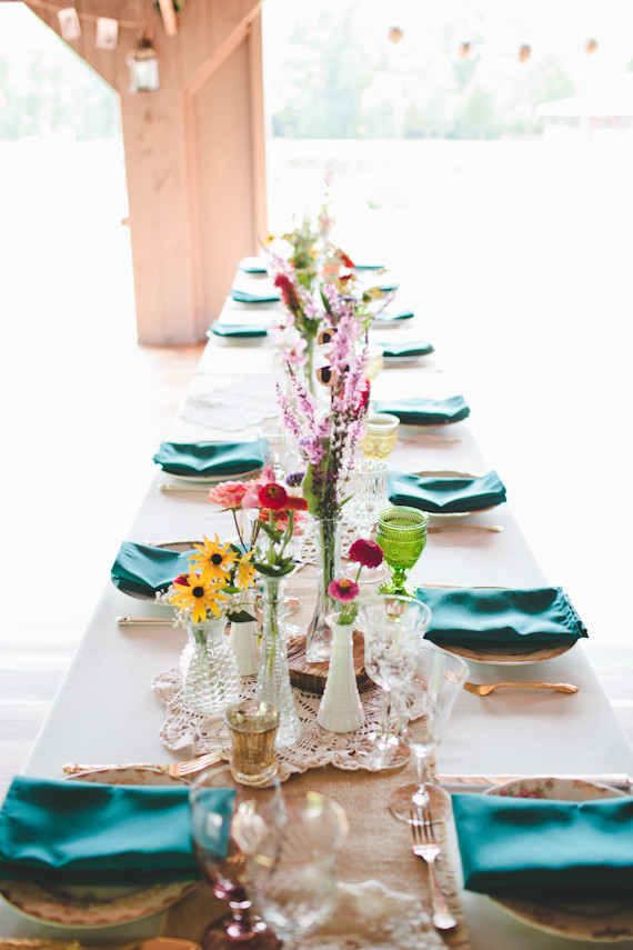 Camp themed colorful wedding tablescape