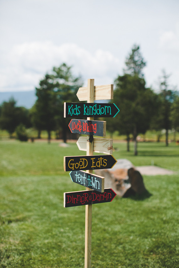 Colorful camp themed wedding signage