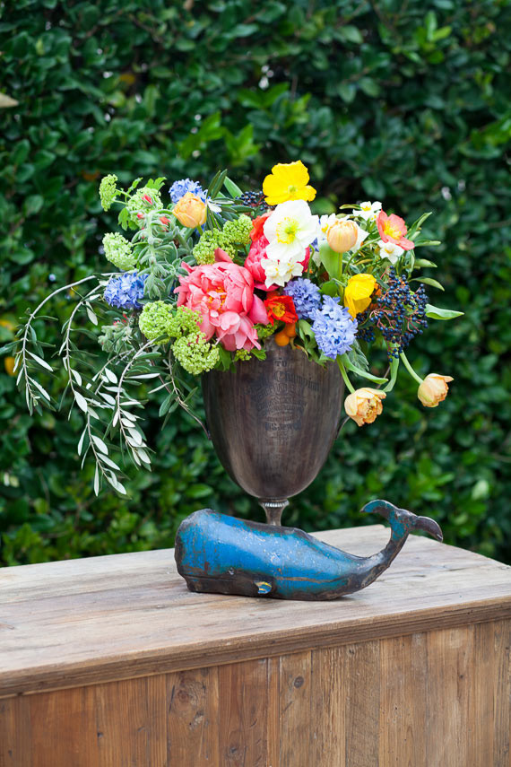 Bronze centerpiece with colorful flowers