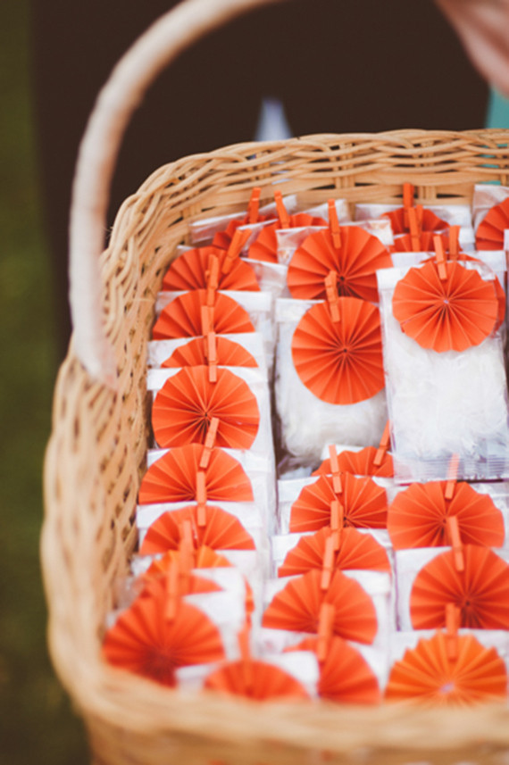 Wedding favors with orange paper flowers