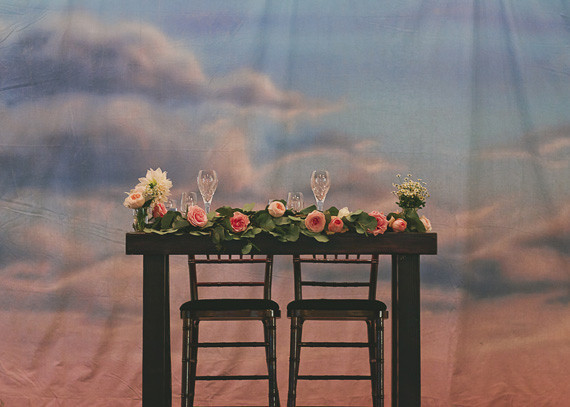 Sky backdrop with wooden tablescape