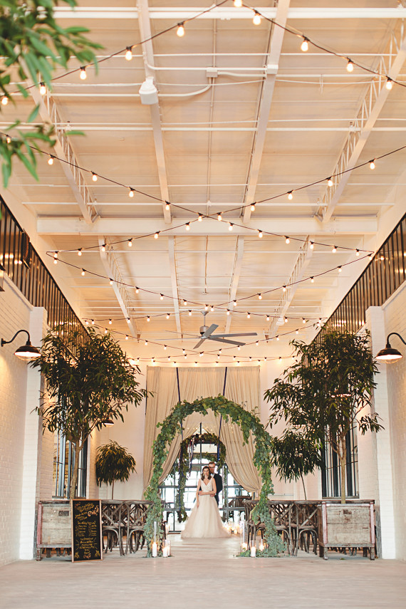 Rustic indoor wedding ceremony