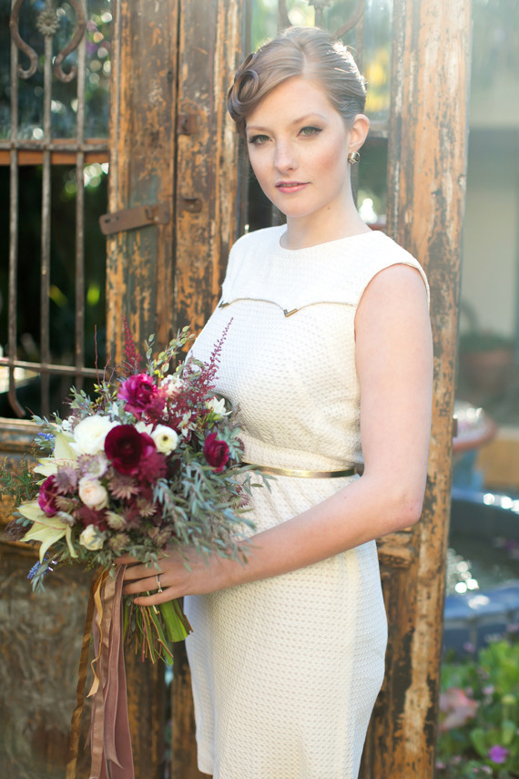 Vintage inspired bride with plum bouquet