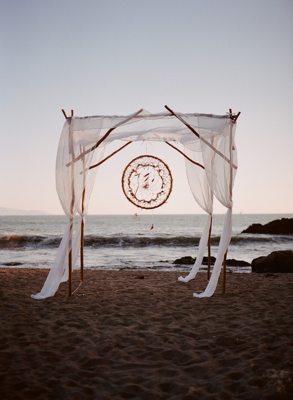 Bohemian beach wedding altar