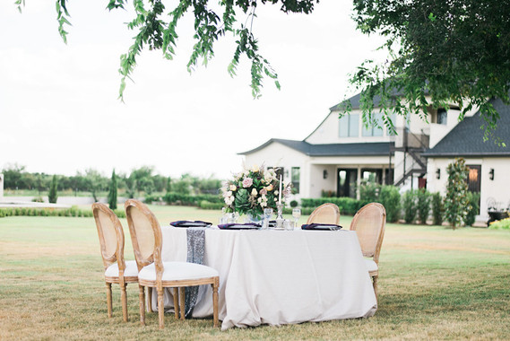 Romantic outdoor wedding tablescape
