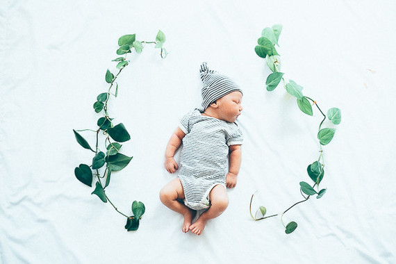 boy newborn photos with vine