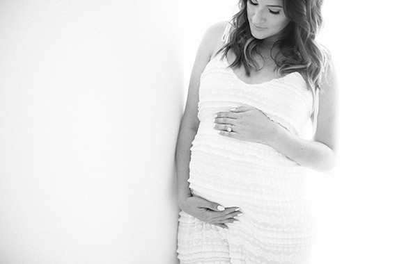 glamorous white maternity photos of Catherine