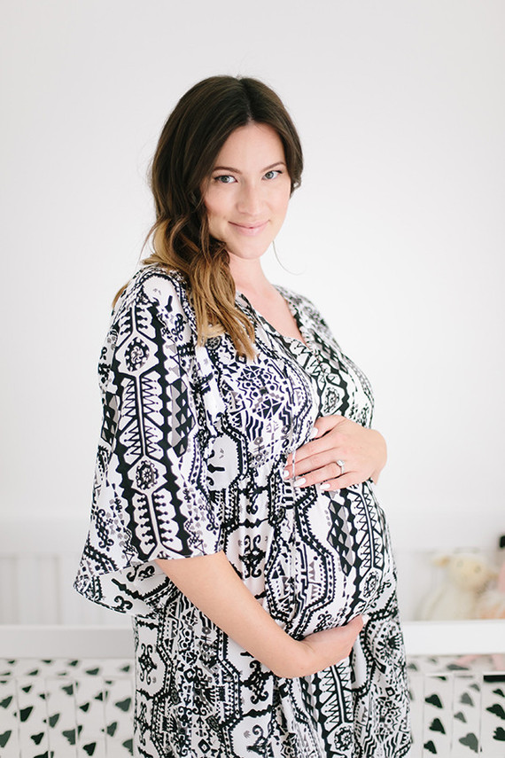 glamorous white maternity photos of Catherine