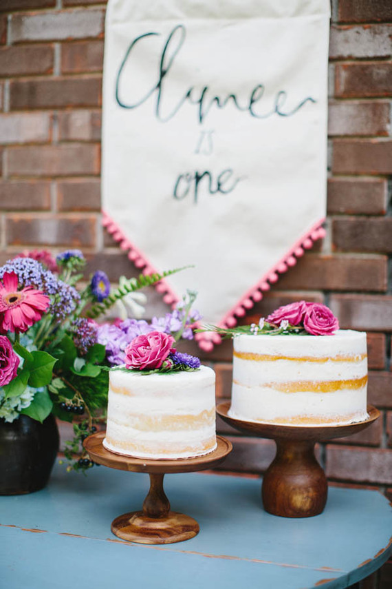 Floral first birthday cakes
