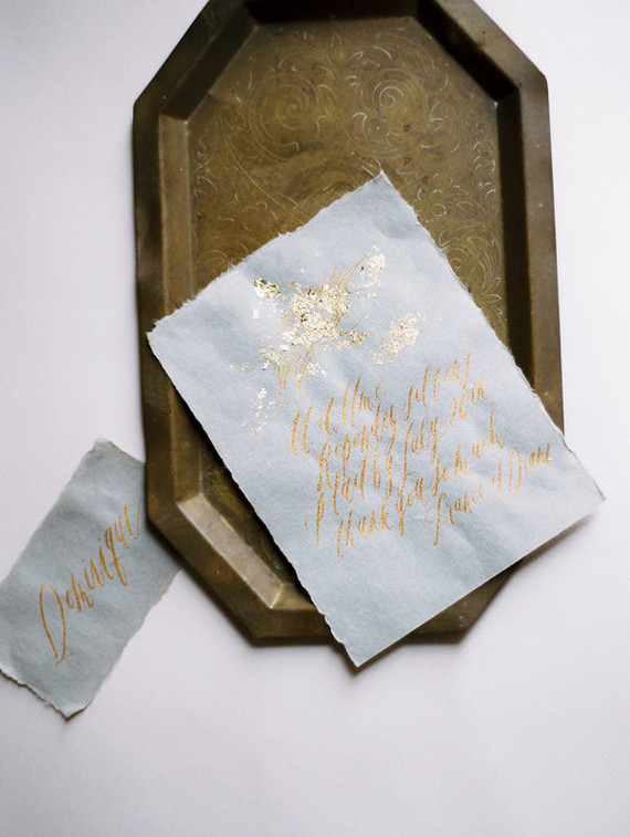 Handwritten gold calligraphy